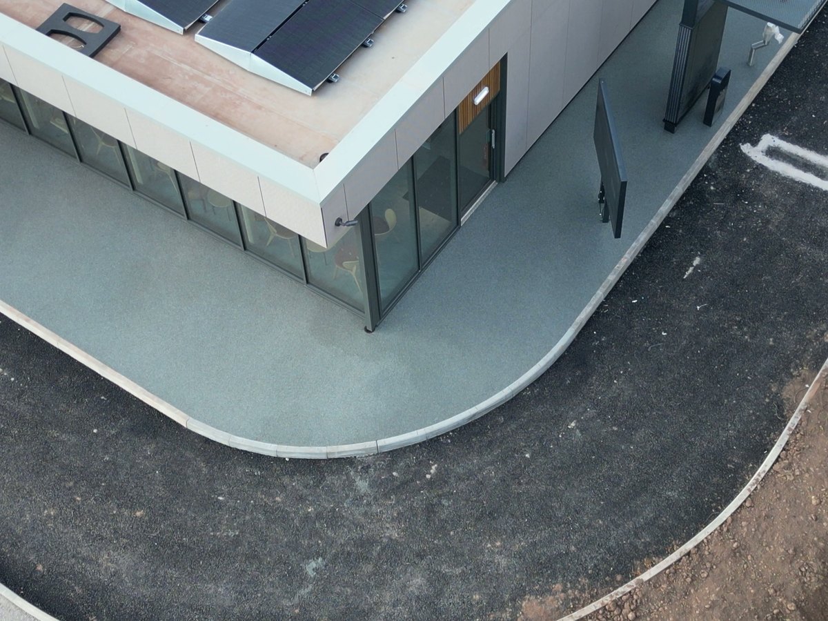 Resin bound pedestrian walkway beside the Starbucks drive-thru